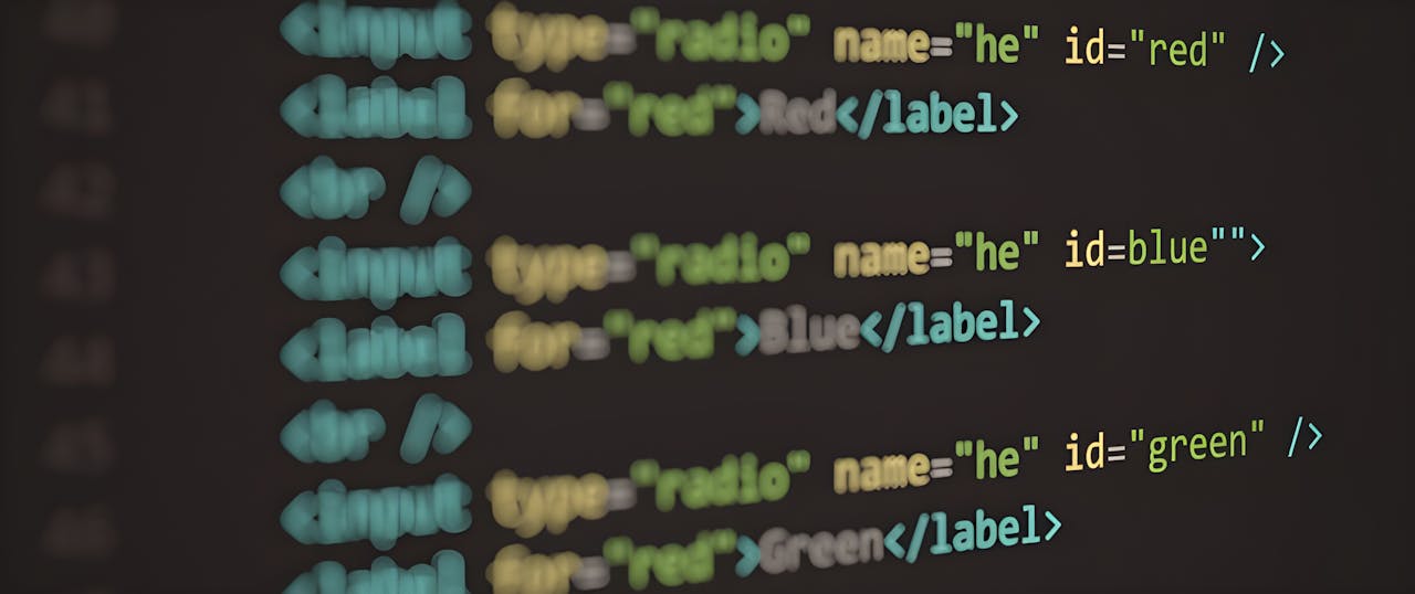 hero-img-01 HTML code displayed on a screen, demonstrating web structure and syntax.
